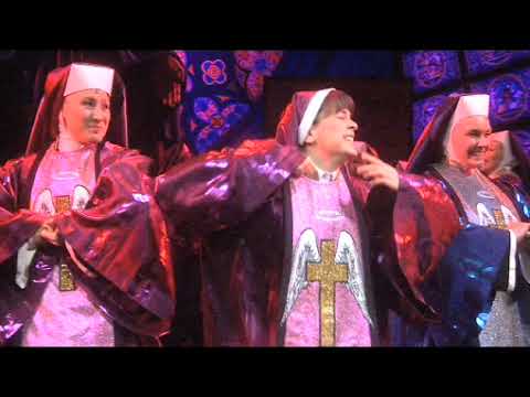Sister Act The Musical 2009 West End trailer still of Deloris with the nuns under spotlight at the London Palladium