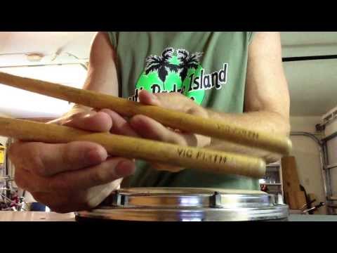 My vintage 1970's practice pad and vintage 1970's Vic Firth drum sticks.