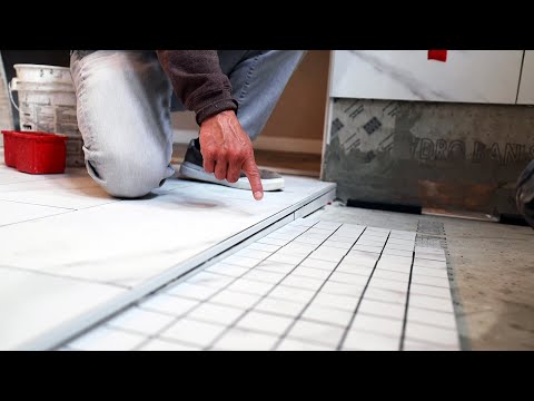 CURBLESS SHOWER TRANSITION --- HOW TO TAPER TILE TO...