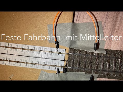 Feste Fahrbahn mit Mittelleiter