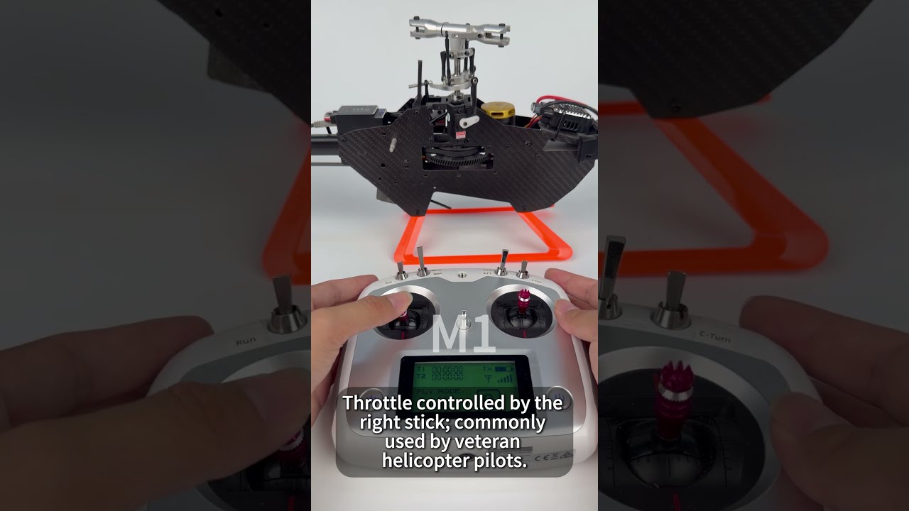 How Do I Switch Between Model 1 and Model 2 on a Helicopter Remote Controller?
