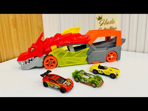 Hot Wheels Toy Car Track Set City Dragon Launch Transporter of 1:64 Scale Car