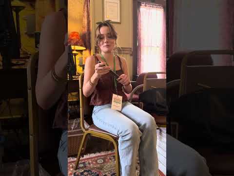 Brenda Dowling tries out a rosewood high D whistle from Irishwhistle.com by Nick Metcalf