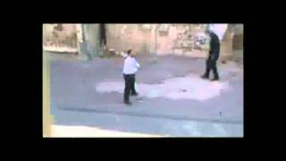 Grief-stricken protester confronts Bahraini riot police