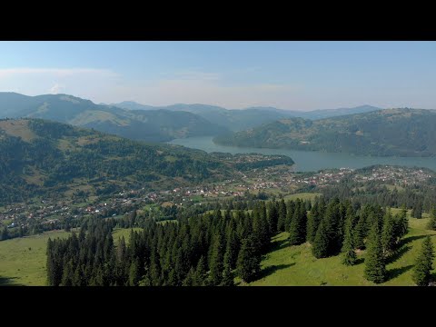 View over Ceahlau and Izvorul Muntelui Lake on the Road to Durau | Romania | 4K