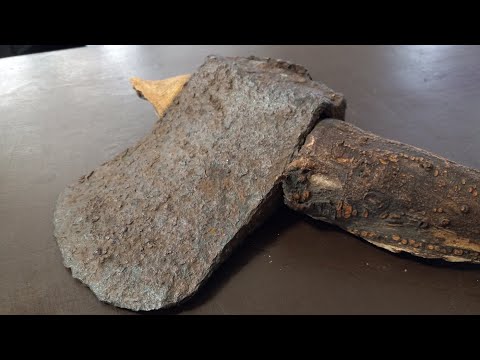 Kansas man finds a mythical looking ax with a root for a handle in his