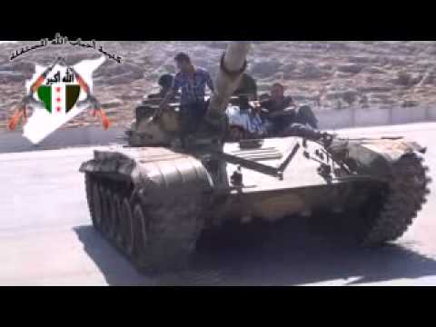 بعض الآليات التي تم السيطرة عليها من قبل كتائب الجيش الحر في ريف إدلب