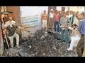 Awesome ! Residents throw corporator into garbage ...