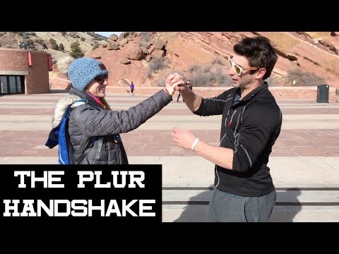 What Does PLUR Mean in EDM? The PLUR Handshake Explained