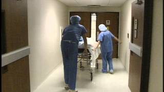 FREE FOOTAGE - Patient Wheeled Through Hospital