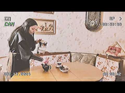 "Yarris Goldhorn drinks tea with cookies 🍪 as the radio plays in the background."