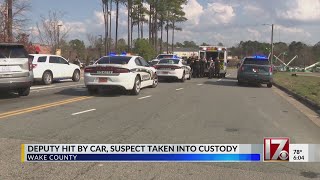 Suspect taken into custody after Wake County deputy hit by car