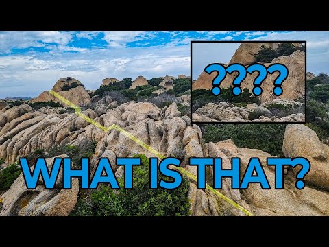 Weird perfectly straight line cutting the rocks. Alien Origin? Any ideas????