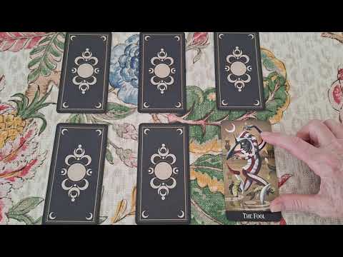 56. The woman in the white bathrobe. Who is she?