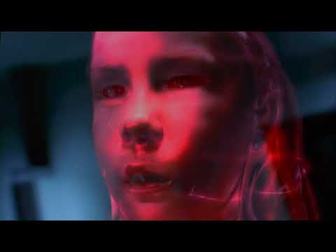 Resident Evil (2002) official trailer frame showing Alice in the Hive corridor lit by red alarms