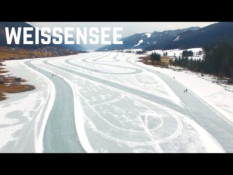 Weissensee Austria Ice Skating on a Frozen Lake (Drone)