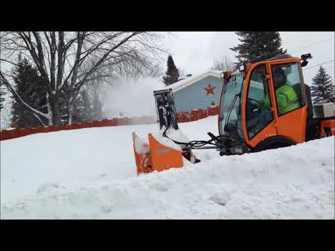 Gaylord, Michigan city vehicles moving snow. We can handle plenty of snow up here!  Alpine Village