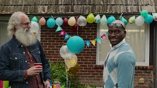 Krusteaz Man brings a tower of pancakes for the kids