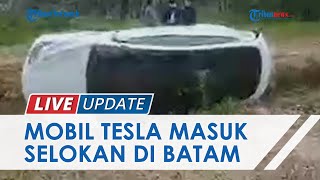 Penampakan Mobil Listrik Tesla Masuk Selokan di Batam, Berawal Terguling Karena Sopir Hilang Kendali