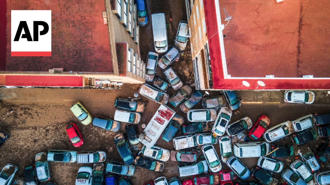 Military units continue the grim search for bodies following devastating floods in Spain