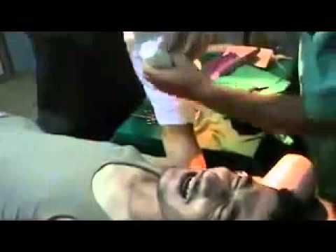 عثمان البيور أحد عناصر فجر الإسلام داخل غرفة العمليات إثر اصابته في احدى المعارك في ريف إدلب