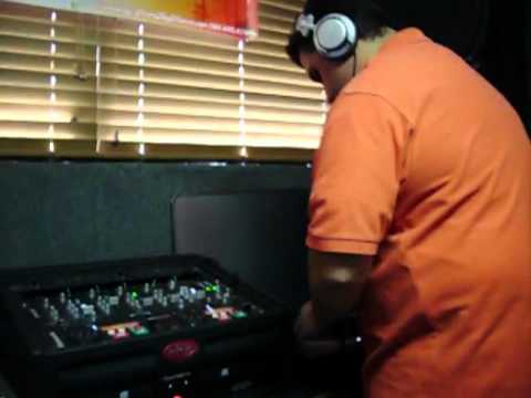DJ Jorge Ojeda mixing on the Midday Show with 