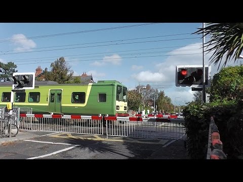 Dart Train at Sandymount Level Crossing in Dublin