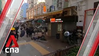 Download lagu Hong Kong police officer shoots 18-year-old protester mp3