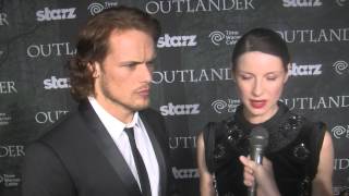 Sam Hueghan and Caitroina Balfe Outlander red carpet Comic Con 2014