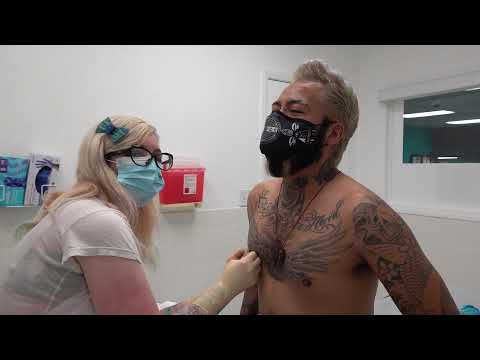 Blue Opal Nipple Piercings on Martin: Tommy T's Body Piercing Huntington Beach, CA