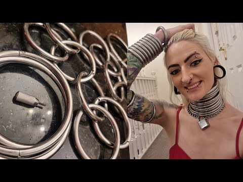 Most collars I've ever worn- 11 steel collars. Steel wearing and removal video.