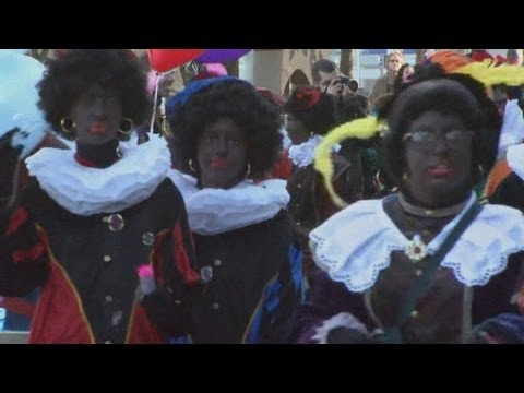 Zwarte Piet: Dutch Christmas parade where Santa's helpers 'black up' sparks racism row
