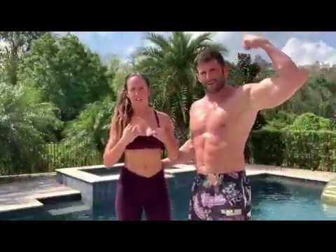 Zack Ryder pushes Chelsea Green into their pool