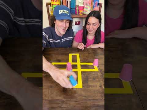 Who will be the last cup standing??💙🩷 #gamenight #boardgames #games #coupleschallenge #challenge