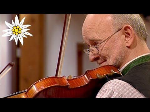 A folk music expert and his young band play a march about their regional inn