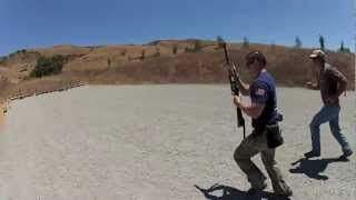 Benelli M1014: 75 yard shot with rifled slug, iron sights.