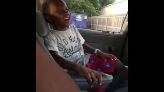 African boy laughing in car 😂😂  Meme templat