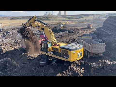 Caterpillar 390D Excavator Loading Trucks With Two Passes - Interkat SA