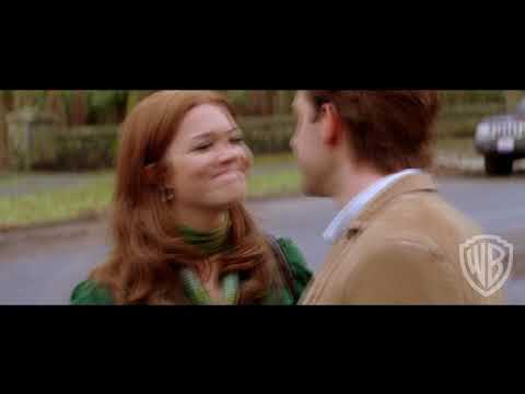 Trailer frame: Ben and Sadie at the beach ceremony with choir voices rising