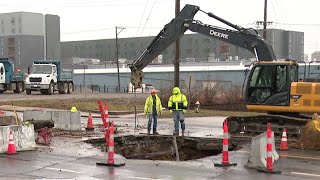 Sewer collapse leaves massive hole in Chouteau Avenue