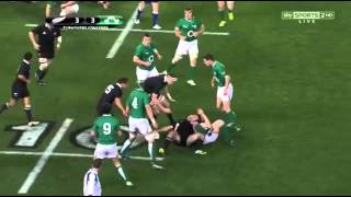 Rob Kearney hands off Sonny Bill