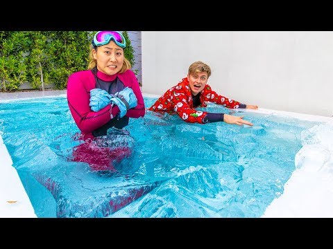 I FROZE MY SWIMMING POOL WITH 7,000 POUNDS OF ICE!! Video