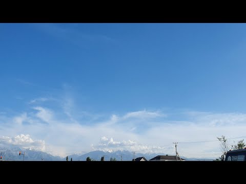 4K. Blue Sky, White Clouds Over The Mountains | Sky And Clouds