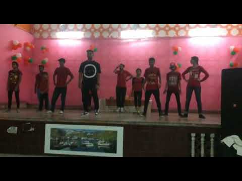 group dance with v company instructor vernon sir and i m in red & black top behind vernon sir..