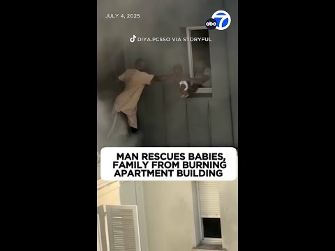Video shows man rescue babies from 6th floor of burning building