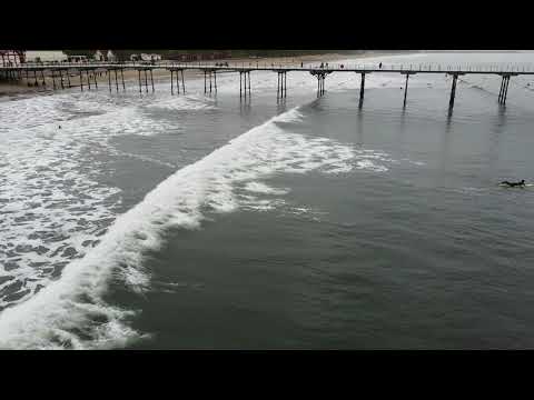 Aerial shots of mellow swell at Saltburn Beach