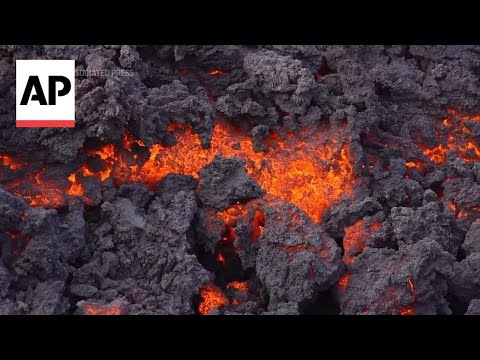 Lava from Iceland volcano eruption flows toward evacuated town