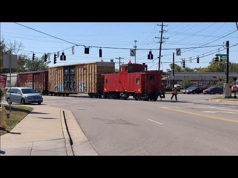 Strangest Railroad Crossing Ever!  Caboose Leads Train Across, Conductor Flags Traffic Video