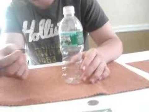Coin thru Bottle Trick