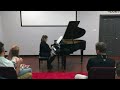 Christine Martin Playing Courageous Kristen The Lion Trainer Music On Her Piano For The Audience